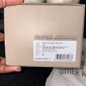 Golden Goose Black and Blue Star Sneakers